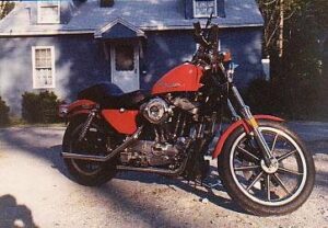 Picture of a red Harley Sportster